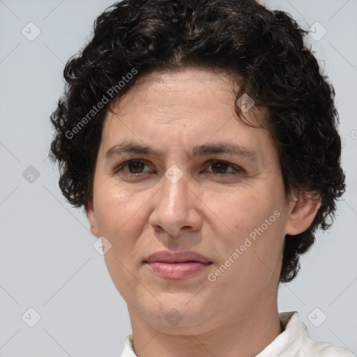 Joyful white adult female with short  brown hair and brown eyes