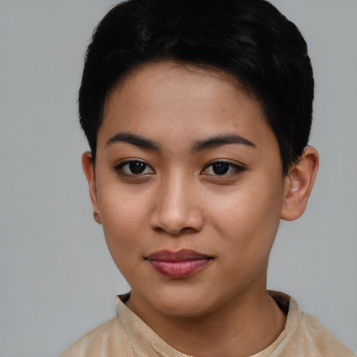 Joyful asian young-adult female with short  black hair and brown eyes