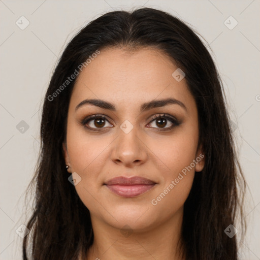 Joyful latino young-adult female with long  brown hair and brown eyes