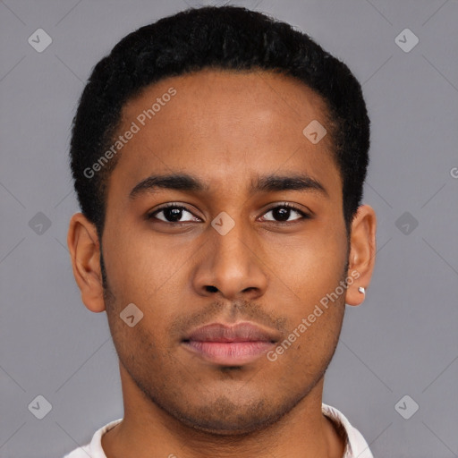 Neutral latino young-adult male with short  brown hair and brown eyes