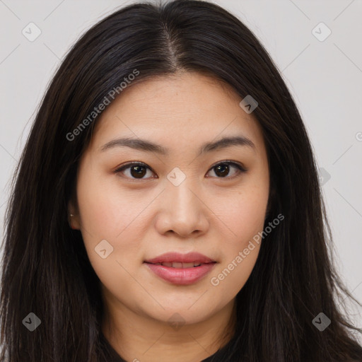 Joyful asian young-adult female with long  brown hair and brown eyes