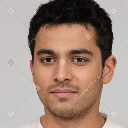 Neutral white young-adult male with short  black hair and brown eyes