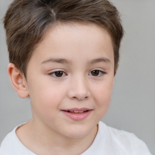 Joyful white child female with short  brown hair and brown eyes