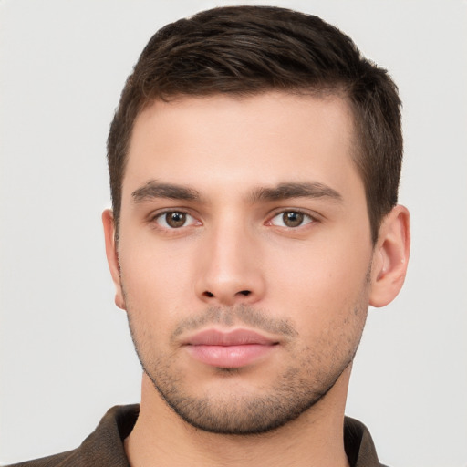 Neutral white young-adult male with short  brown hair and brown eyes