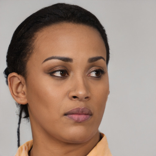 Neutral latino young-adult female with short  brown hair and brown eyes