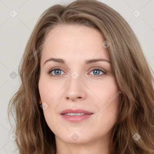 Joyful white young-adult female with long  brown hair and green eyes