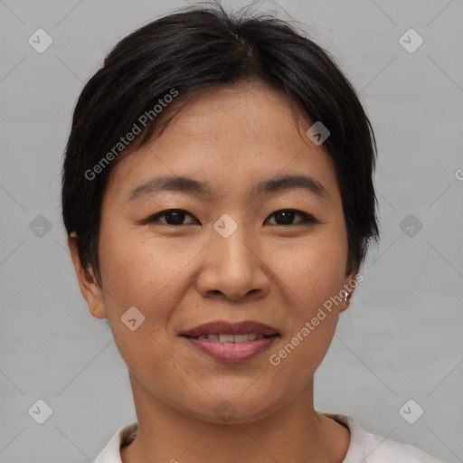 Joyful asian young-adult female with short  brown hair and brown eyes