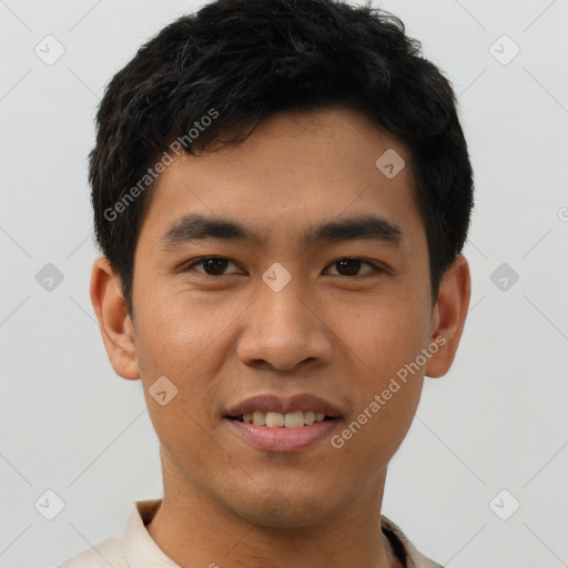 Joyful asian young-adult male with short  black hair and brown eyes