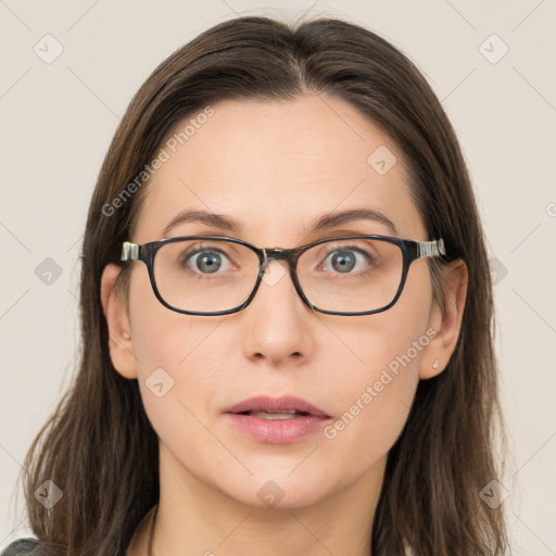 Neutral white young-adult female with long  brown hair and brown eyes