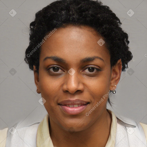 Joyful black young-adult female with short  black hair and brown eyes