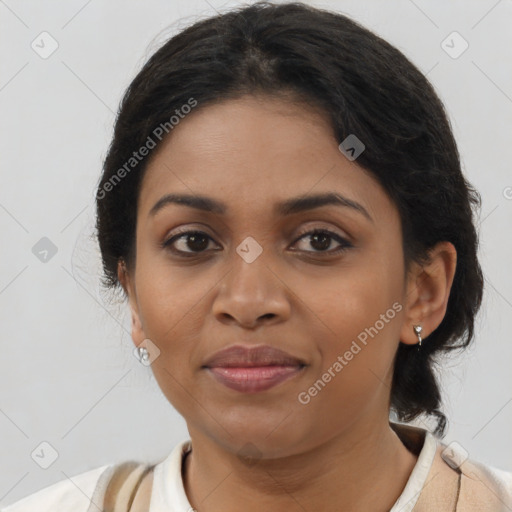 Joyful latino young-adult female with medium  brown hair and brown eyes