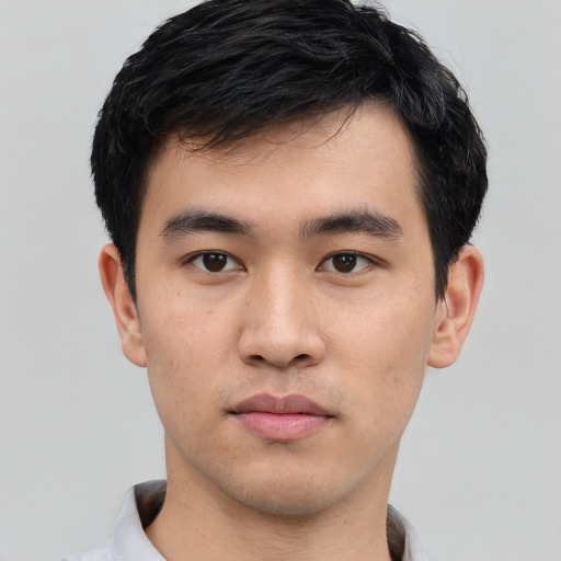 Neutral asian young-adult male with short  black hair and brown eyes