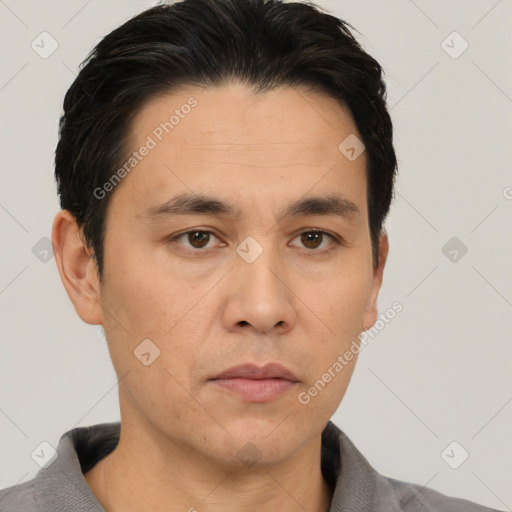 Neutral asian adult male with short  black hair and brown eyes