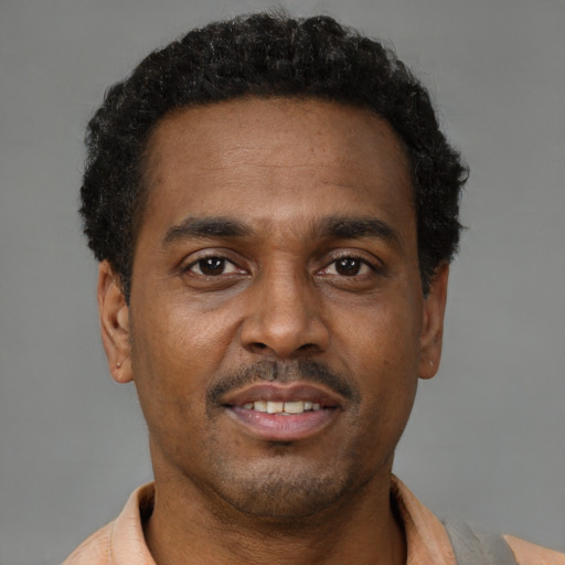 Neutral black young-adult male with short  brown hair and brown eyes