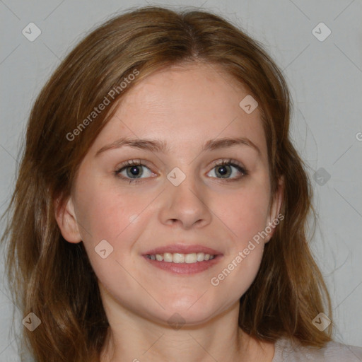 Joyful white young-adult female with medium  brown hair and blue eyes