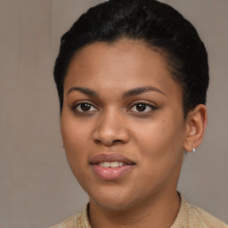 Joyful latino young-adult female with short  brown hair and brown eyes