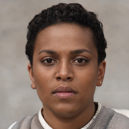 Neutral black young-adult female with short  black hair and brown eyes