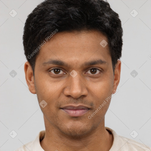Joyful latino young-adult male with short  brown hair and brown eyes