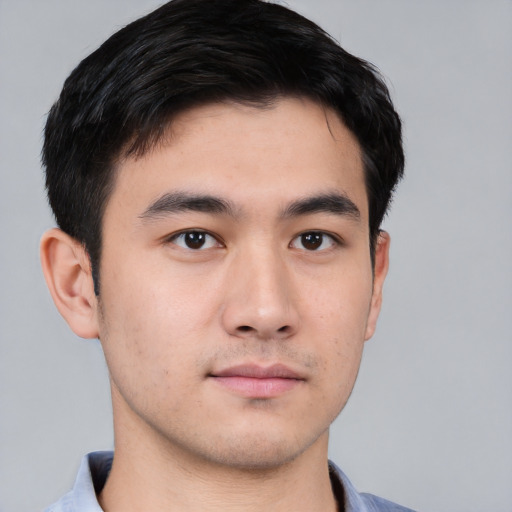 Neutral asian young-adult male with short  black hair and brown eyes