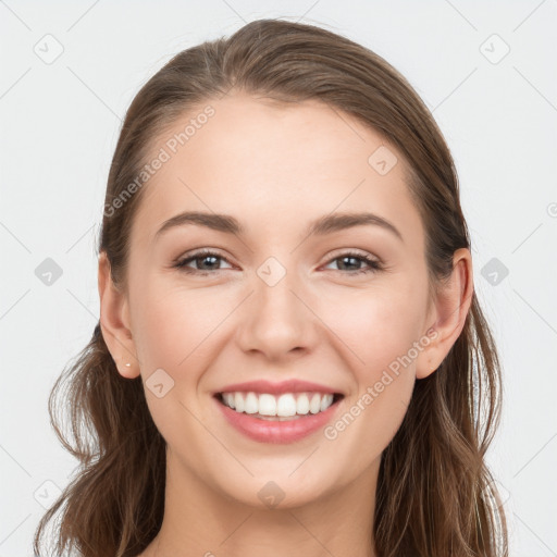 Joyful white young-adult female with long  brown hair and grey eyes