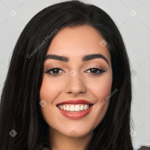 Joyful latino young-adult female with long  black hair and brown eyes