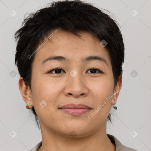 Joyful asian young-adult female with short  brown hair and brown eyes