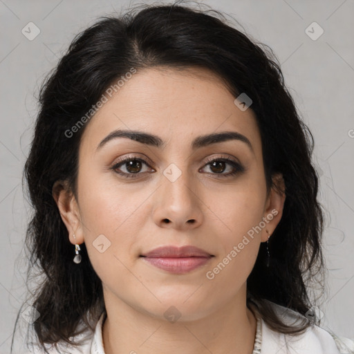 Joyful latino young-adult female with medium  brown hair and brown eyes