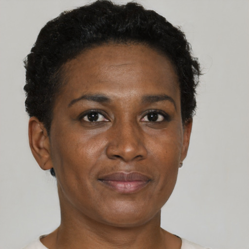 Neutral black adult female with short  brown hair and brown eyes