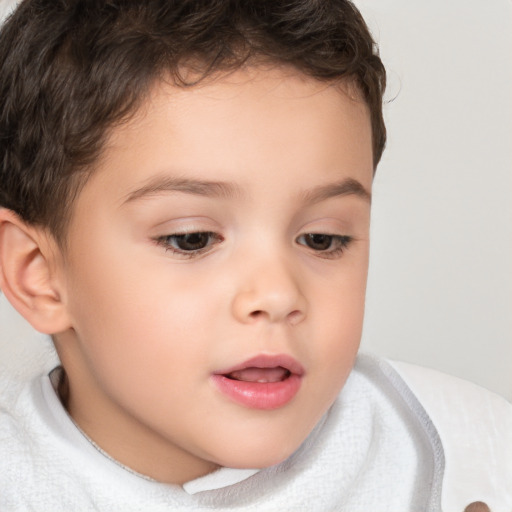 Neutral white child male with short  brown hair and brown eyes