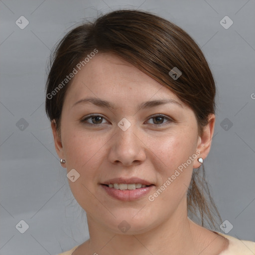 Joyful white young-adult female with medium  brown hair and grey eyes