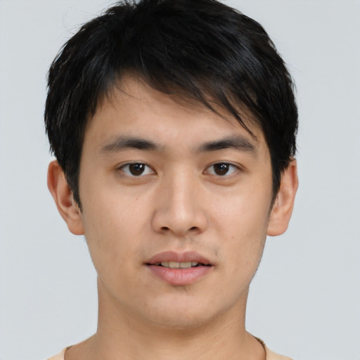Neutral asian young-adult male with short  brown hair and brown eyes