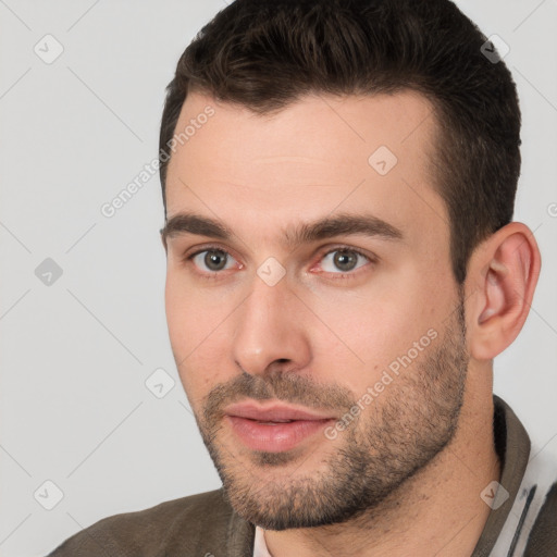 Neutral white young-adult male with short  brown hair and brown eyes