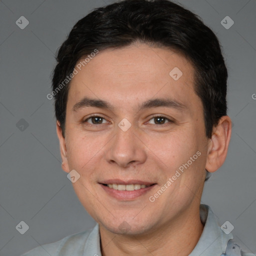 Joyful white adult male with short  brown hair and brown eyes