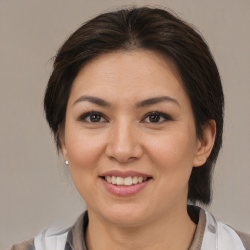 Joyful white young-adult female with medium  brown hair and brown eyes