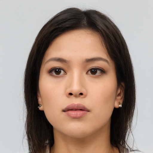 Neutral asian young-adult female with long  brown hair and brown eyes
