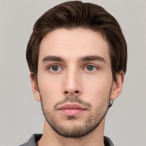 Neutral white young-adult male with short  brown hair and brown eyes