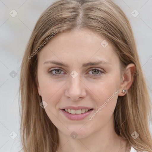 Joyful white young-adult female with long  brown hair and grey eyes