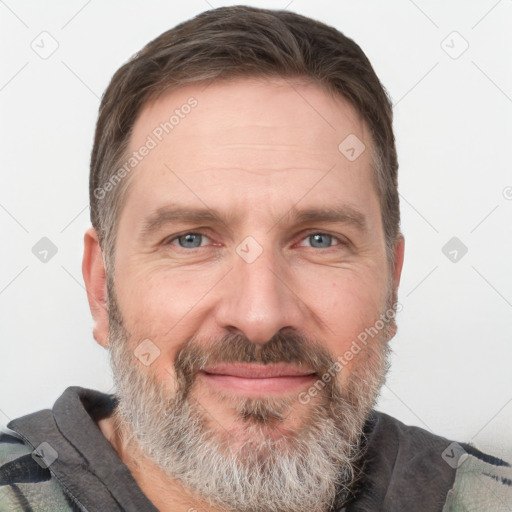 Joyful white adult male with short  brown hair and grey eyes