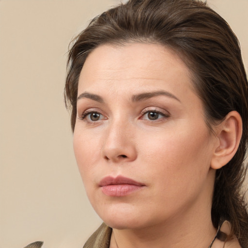 Neutral white young-adult female with medium  brown hair and brown eyes