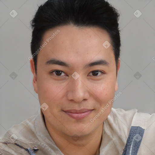 Joyful asian young-adult male with short  brown hair and brown eyes