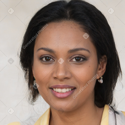 Joyful black young-adult female with medium  brown hair and brown eyes