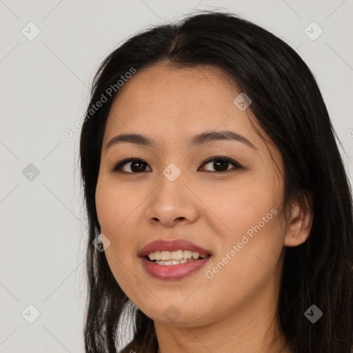 Joyful asian young-adult female with long  black hair and brown eyes