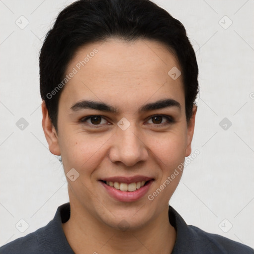 Joyful latino young-adult female with short  brown hair and brown eyes