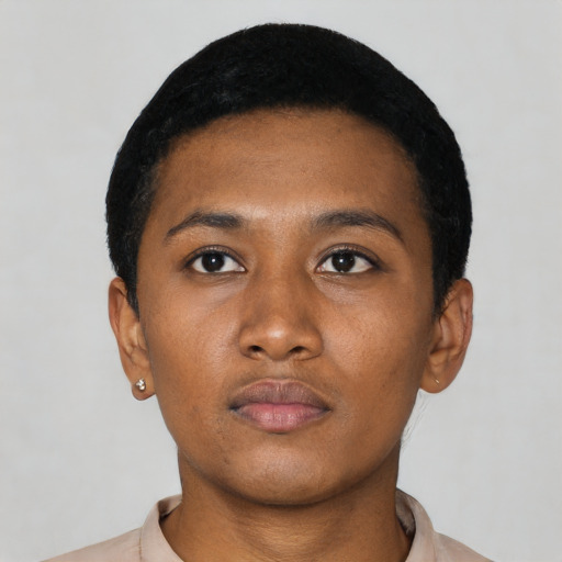 Neutral latino young-adult female with short  black hair and brown eyes
