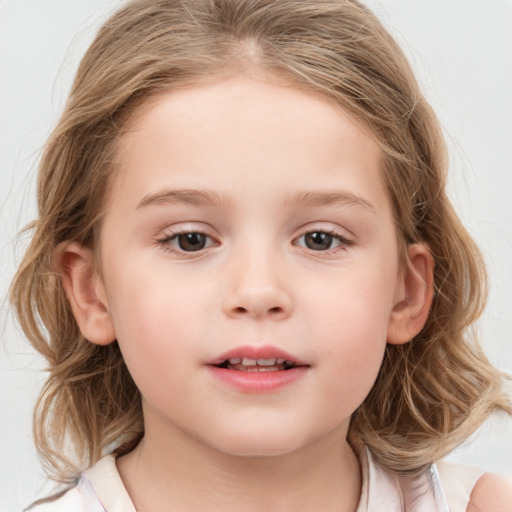 Neutral white child female with medium  brown hair and grey eyes