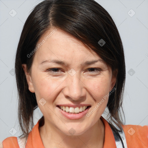 Joyful white adult female with medium  brown hair and brown eyes