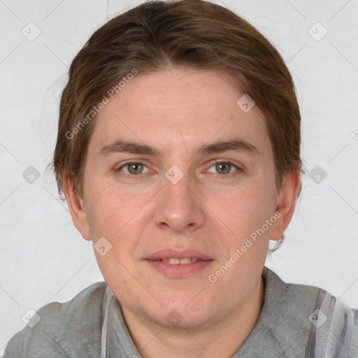 Joyful white adult male with short  brown hair and grey eyes