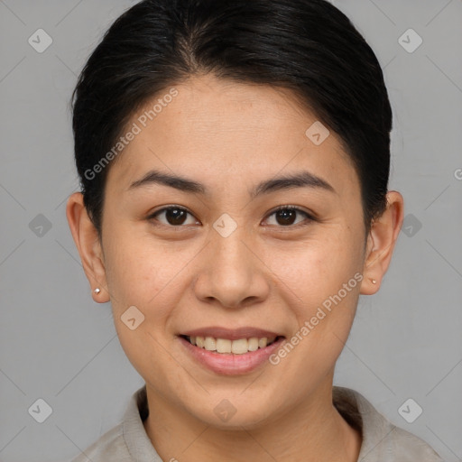 Joyful asian young-adult female with short  brown hair and brown eyes