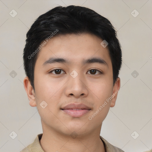 Joyful asian young-adult male with short  black hair and brown eyes