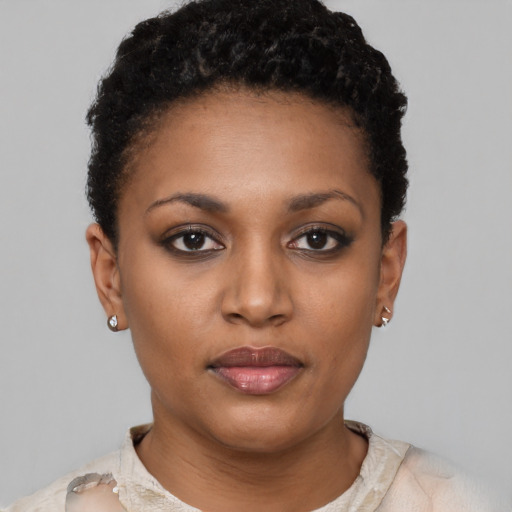 Neutral black young-adult female with short  black hair and brown eyes
